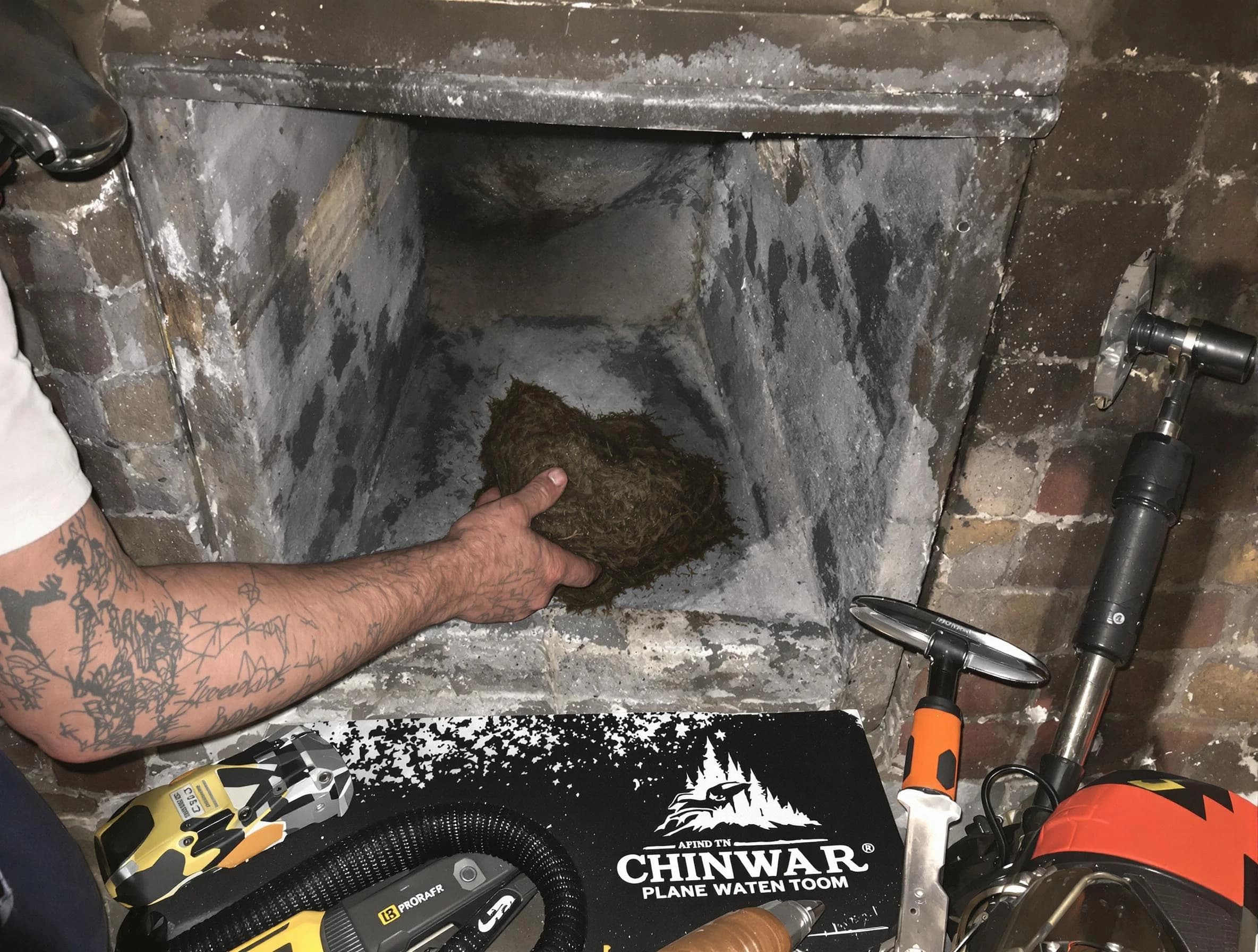 Shelbyville Chimney Sweep safely removing debris and screening chimney in Shelbyville, TN